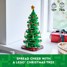 Assembled green LEGO Christmas tree model with star topper on display base