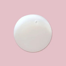 White gel product sample in a round smear, glossy surface