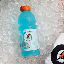 Light blue Gatorade Frost Thirst Quencher bottle with orange cap and front label