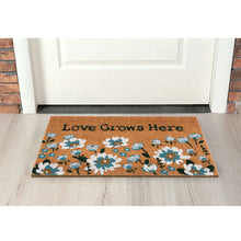 Outdoor doormat with blue flowers and 'Love Grows Here' lettering