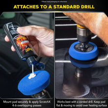 Drill-mounted foam pad with hand applying ScratchX from a bottle