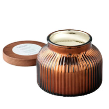 Amber ribbed glass jar candle with wooden lid, two wicks, glass top open