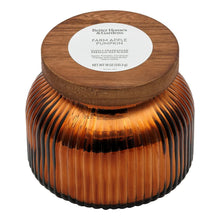 Amber ribbed glass candle jar with round wooden lid