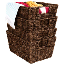 Seagrass laundry organizer tote basket with insert handles, holding folded towels inside