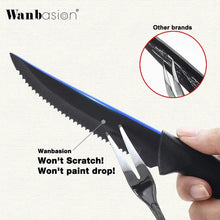 Black-handled serrated steak knife with pointed tip