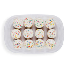 Large rectangular plastic food container filled with frosted cupcakes