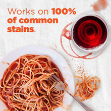 Stain-removal scene with red-tinted liquid, pasta, and a detergent cap on sink