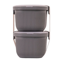 Grey rectangular plastic bento snack containers with two lidded sections and carry handle