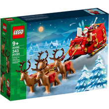 Santa's sleigh building set box showing red sleigh, reindeer, and Santa minifigure