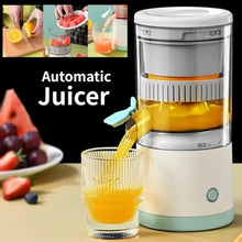 Automatic citrus juicer dispensing orange juice into a glass cup