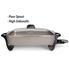 Electric ceramic skillet with glass lid and black side handles, silver-gray cooking pan