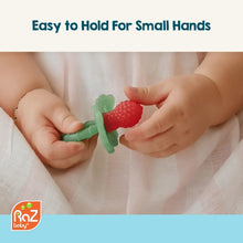 RaZberry silicone teether toy, green and red textured berry with ring handles.