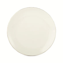 Cream white ceramic dinner plate with plain smooth surface