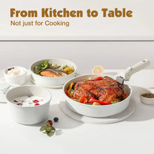White speckled pots with detachable handles on a kitchen counter with food inside