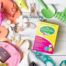 Culturelle Kids probiotic chewable tablets box on a table with toys and flowers