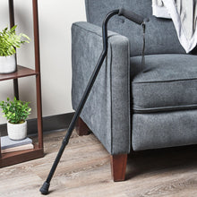 Black offset handle cane with foam grip, adjustable shaft, and rubber foot