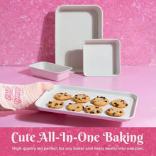 Pink ceramic nonstick bakeware set with cookie sheet and small loaf-style pan