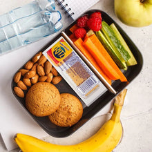 Crackers and cheese dip snack pack with crackers, dip, and veggies