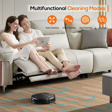 Black robotic vacuum with top control buttons and edge-cleaning side brushes