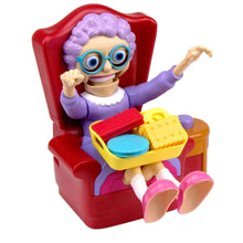 Greedy Granny toy granny in red chair holding food tray and cheese pieces