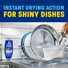 Dish soap bottle beside an open dish rack with suds and a shiny kettle