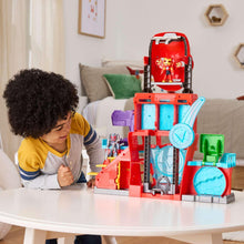 Red and blue Iron Man electronic playset with spinning arm and side gear pieces