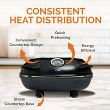 Electric countertop pizza oven in black with central dial and raised lid handle.