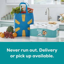 Angel Soft mega rolls pack beside a tote bag, teal-and-white toilet paper rolls