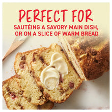 Spreadable butter with olive oil & sea salt on warm bread slices