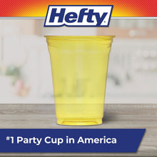 Translucent plastic party cup in yellow with a flared rim