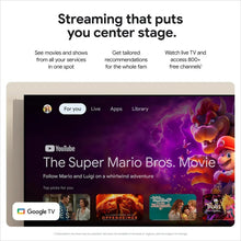 Streaming interface on TV screen with movie listings and app navigation tabs.