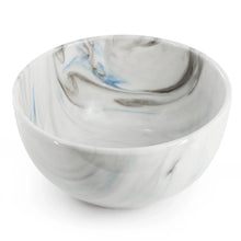 Porcelain serving bowl with blue and gray marble-style swirls