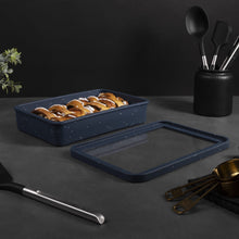 Atlantic blue silicone baking dish with lid, filled with sliced pastries