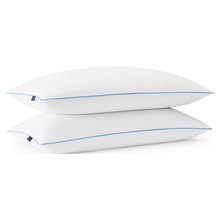 White cooling bed pillows with blue edges, pair shown stacked