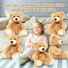 Brown plush teddy bears with bow ties on a sofa cushion