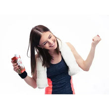 Protein shake cartons held by a person, Member's Mark chocolate flavor