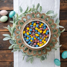 Mini eggs candy in a bag with wreath centerpiece showing multicolor eggs