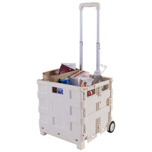 White collapsible utility cart holding supplies with extendable handle and wheels