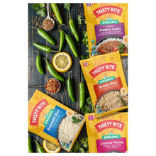 Organic Channa Masala pouch among other organic pouches on vegetable-themed background