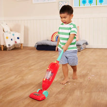 Preschool toy vacuum with red body, teal handle, and clear dust chamber