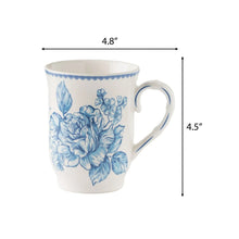 Blue floral stoneware mug with curved handle and scalloped rim