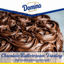 Chocolate buttercream frosting swirl on a dessert surface