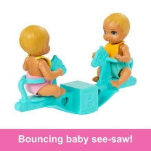 Teal bouncing baby see-saw with two blonde baby dolls