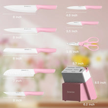 Kitchen knife set with pink handles and size guide, plus scissors and storage block