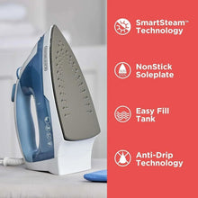 Steam iron close-up with textured soleplate and vent holes
