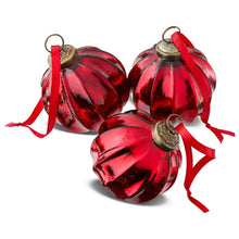 Set of 4 red glass ball ornaments with red ribbons and bronze caps