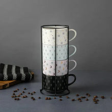 Stacking mug set in a black stand, stoneware with star and moon celestial prints