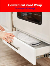 Electric pizza oven with cord stored in the base compartment