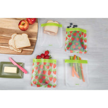 Reusable plastic storage bags with strawberry and fruit prints, green zip tops