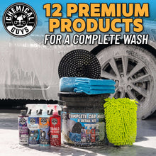 Car wash kit with wheel brush, yellow and blue microfiber towels, and multiple bottles